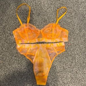 Savage x Fenty bra and panty set. Orange tye dye, bra 34A, small panty. NWT.